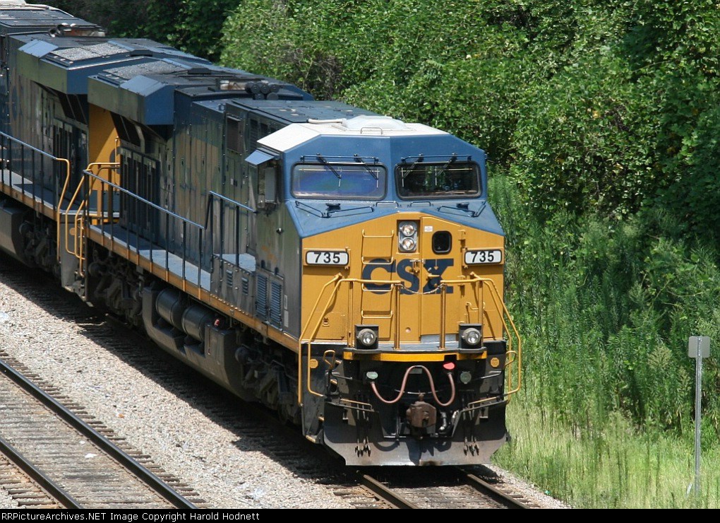 CSX 735 leads a loaded coal train